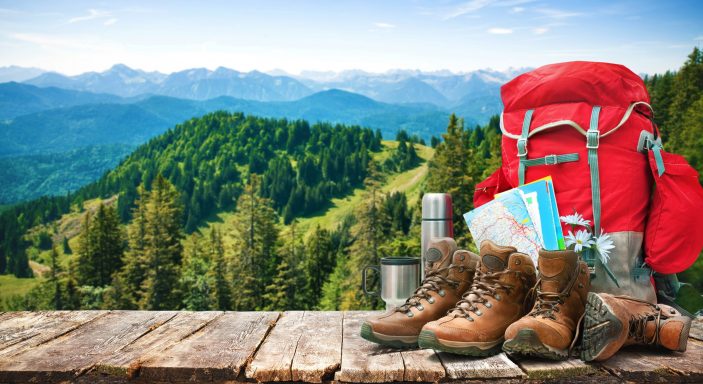 Big backpack and trekking boots